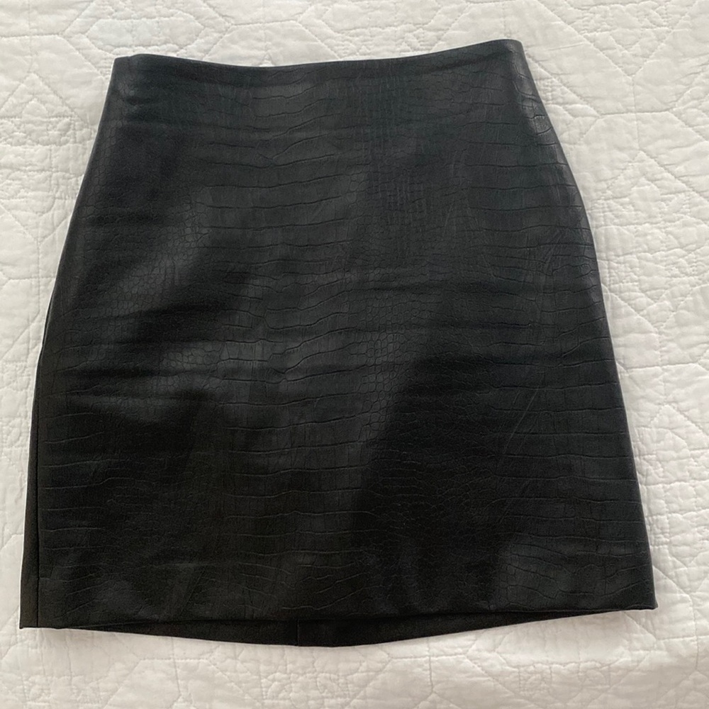 Black snake print mini skirt, high waisted.